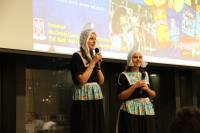 The College exchange students from universities in the Netherlands, Ms Silvia GROTHE I RIERA (right) and Ms Isabelle Amber TABAK (left), promoting the Dutch Cultural Night in traditional Zeeland costumes during the communal dinner on 9 April 2019